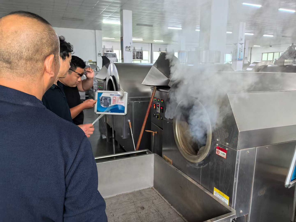 Customer inspection of 100kg sesame roasted food machine