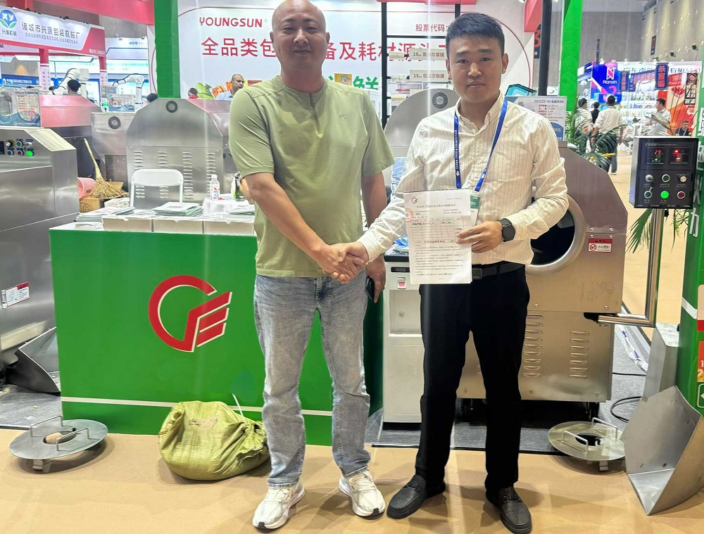 Customers purchase mobile phones at the exhibition site